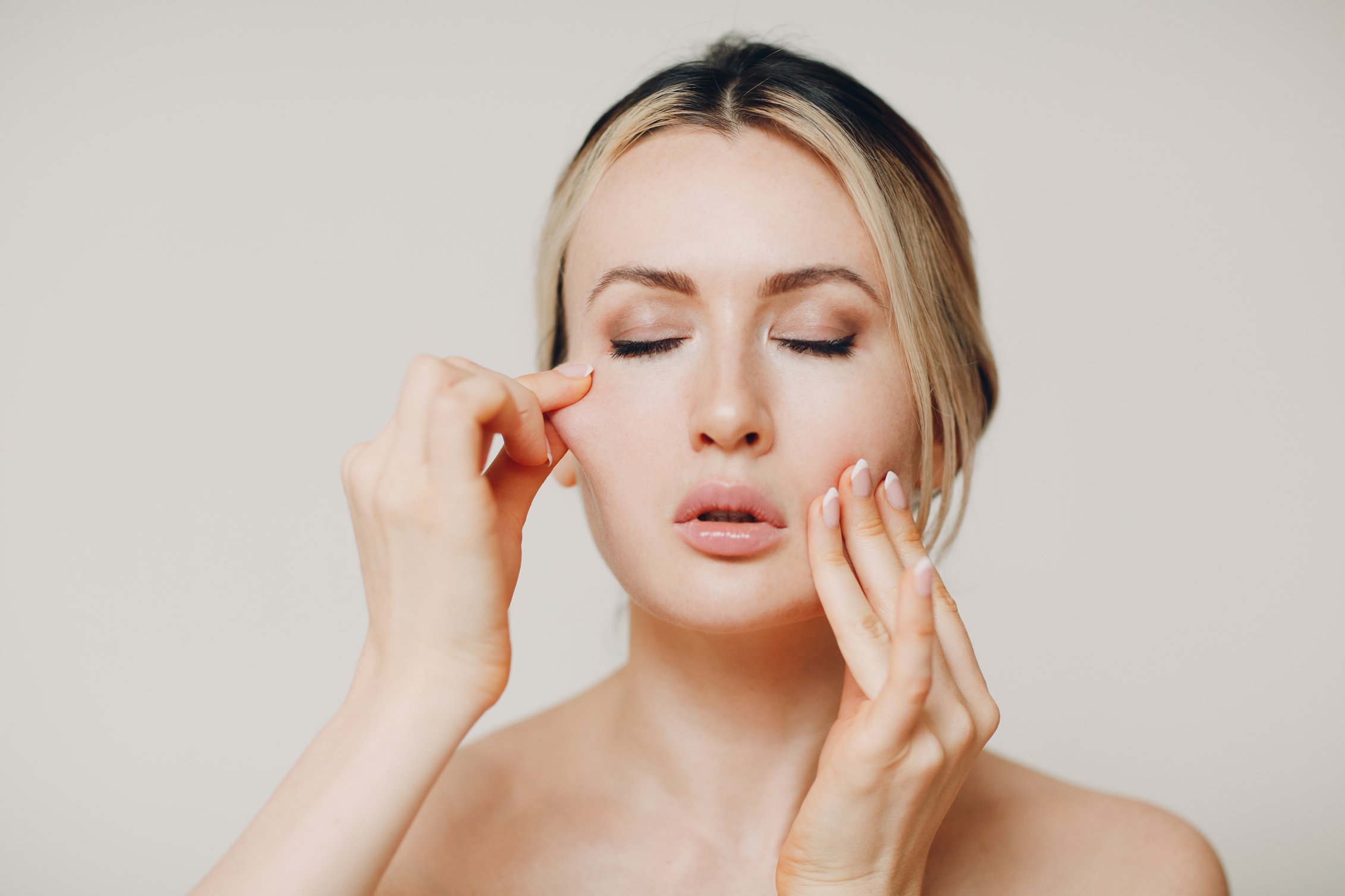 Woman Doing Facial Gymnastics Self Yoga Massage and Exercises for Face Skin.